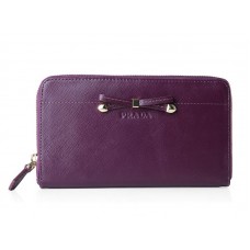 Prada Saffiano Zippy Wallet With Bow Detail Purple